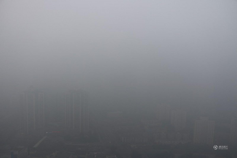 京津雾霾季空气重污染 城市如面纱笼罩(高清组图)