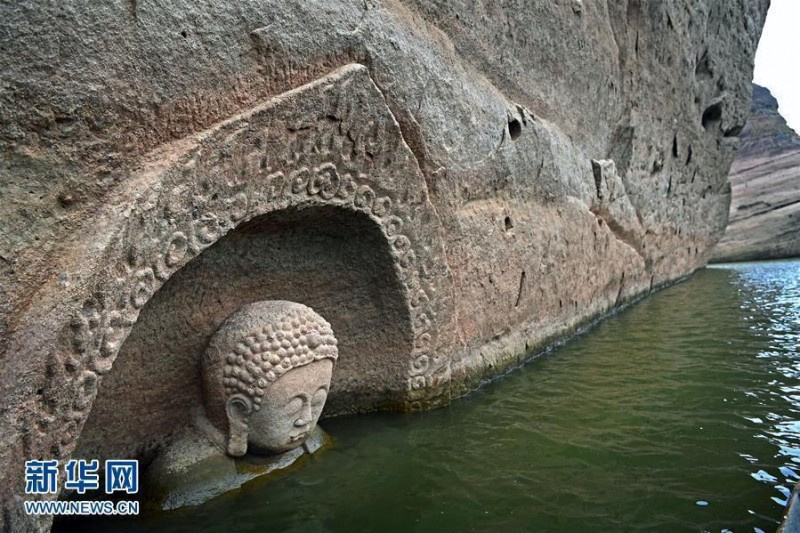 江西一水库发现摩崖造像 "佛头"遗迹浮出水面(图)